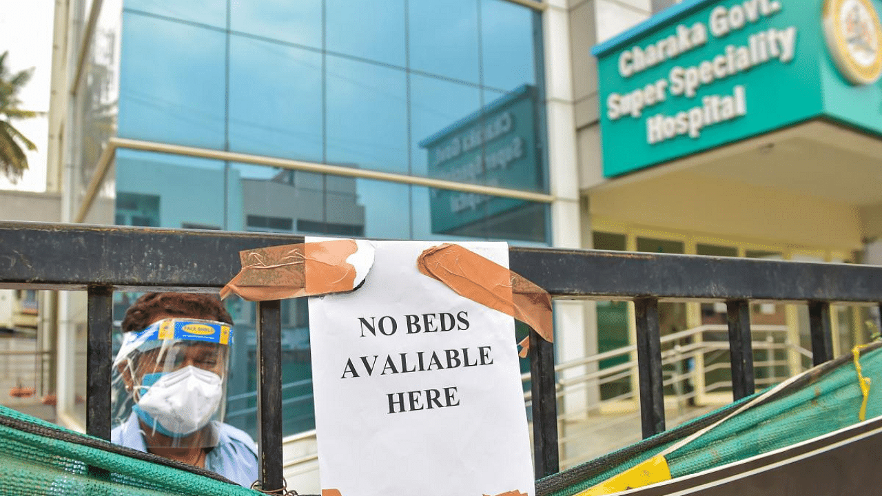 A message at the entrance of a government hospital states non-availability of beds, amid surge in coronavirus cases in Bengaluru. Credit: PTI photo. 