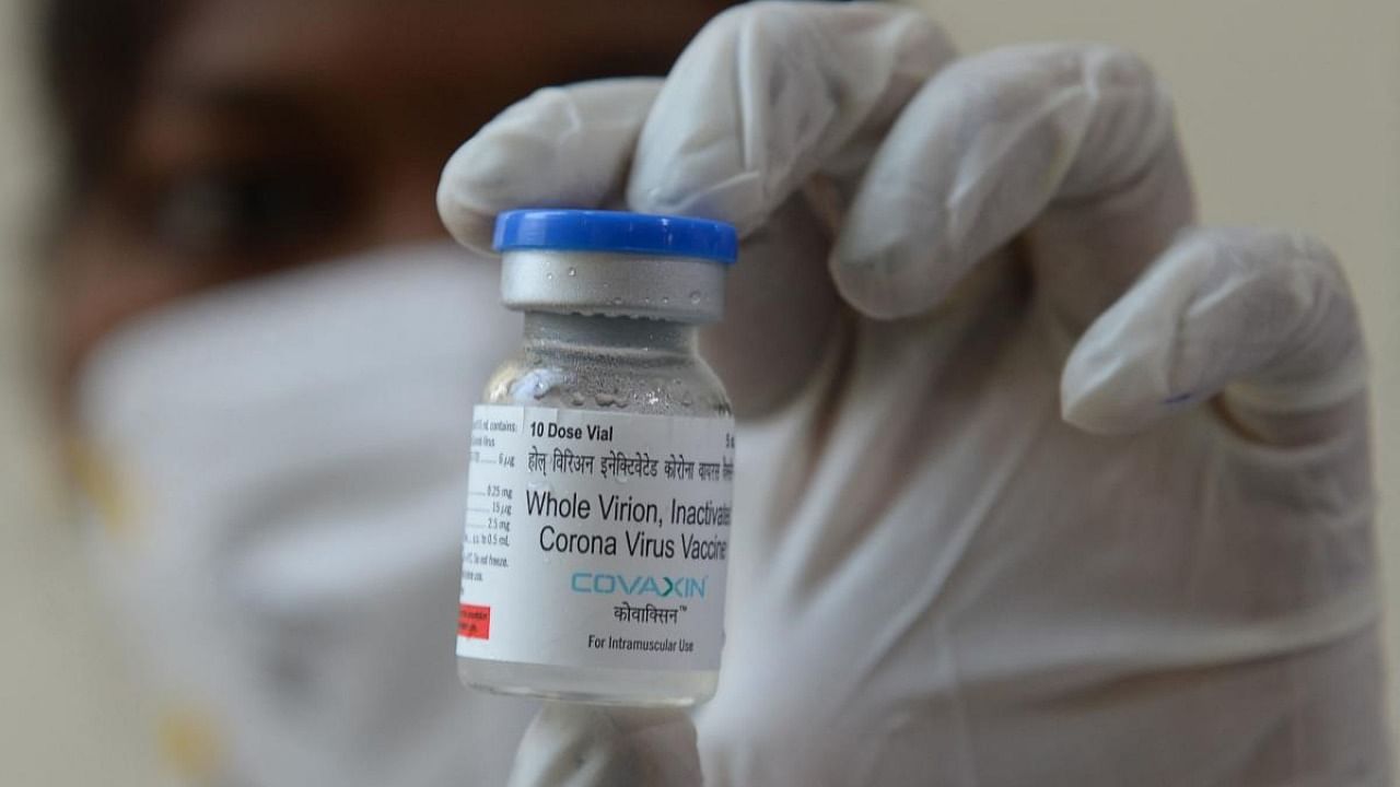 A medical worker displays a vial of Covaxin Covid-19 coronavirus vaccine. Credit: AFP Photo