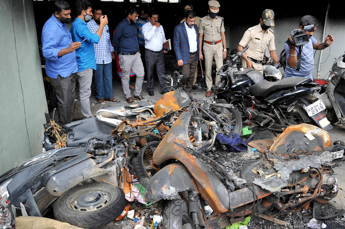 Vehicles damaged during the East Bengaluru violence. DH FILE PHOTO/PUSHKAR V