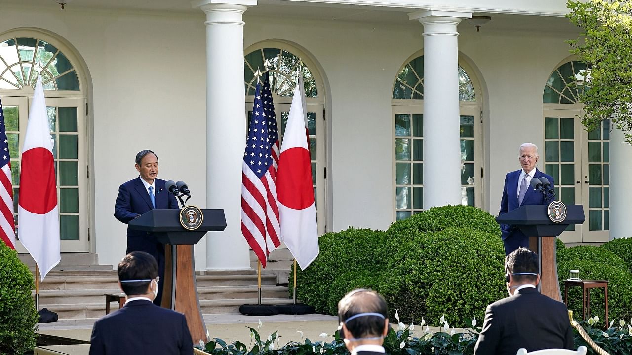 US President Joe Biden and Japan's Prime Minister Yoshihide Suga take part in a joint press conference in the Rose Garden of the White House in Washington, DC. Credit: AFP Photo