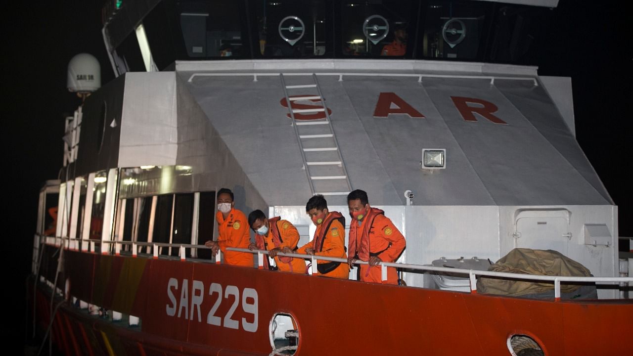 Members of National Search and Rescue Agency (BASARNAS) prepare for a search mission for The Indonesian Navy submarine KRI Nanggala at Benoa harbor in Bali, Indonesia. Credit: AP/PTI photo