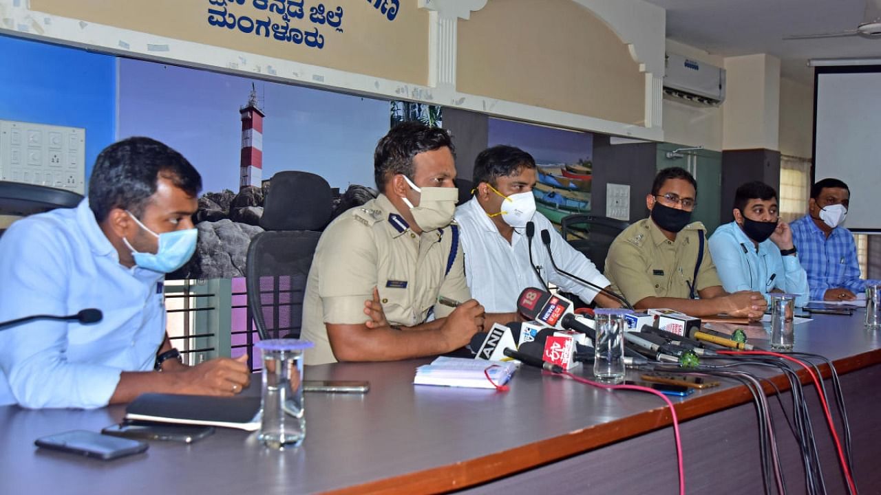 Dakshina Kannada Deputy Commissioner Dr Rajendra speaks to media persons in Mangaluru on Wednesday. Mangaluru Commissioner of Police N Shashi Kumar and others are present. Credit: DH Photo