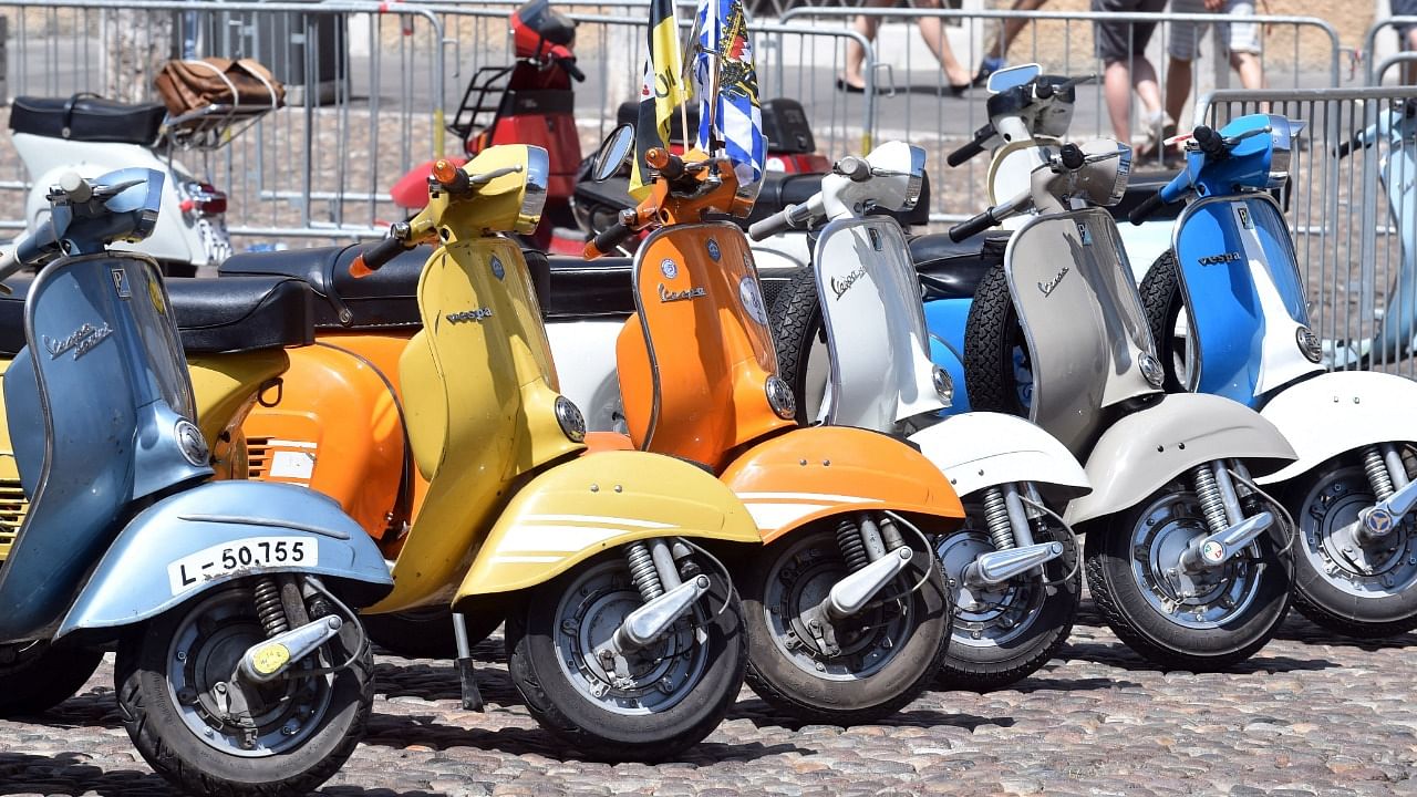 Vespa scooters are parked on Sordello Square in Mantova, northern Italy. Credit: AFP File Photo