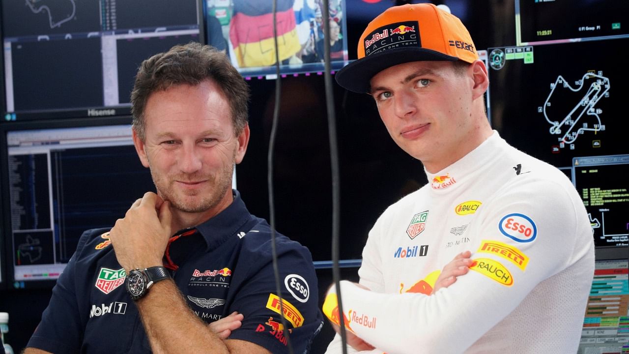 Red Bull's Max Verstappen (R) beside team principal Christian Horner(L). Credit: Reuters File Photo