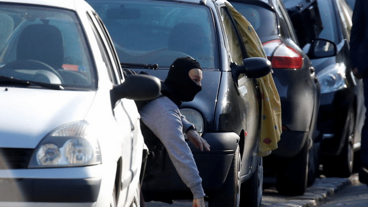 A police officer works in the area where an attacker stabbed a female police administrative worker, in Rambouillet, near Paris, France, April 23, 2021. Credit: Reuters Photo