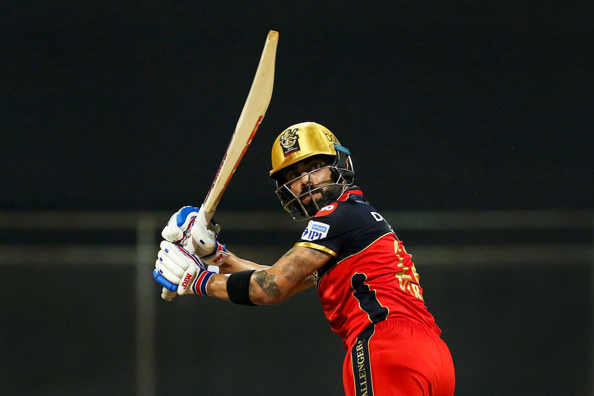  Virat Kohli plays a shot during match 16 of Indian Premier League 2021 between the Royal Challengers Bangalore and the Rajasthan Royals. Credit: PTI photo.
