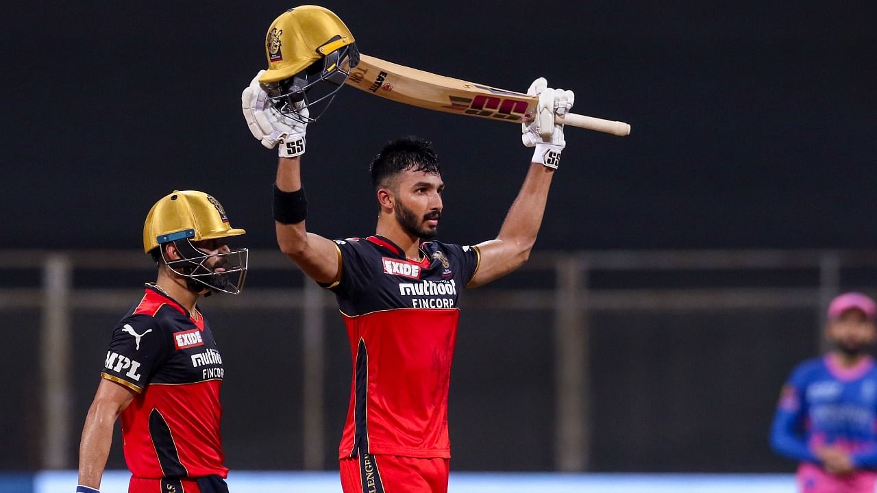 Devdutt Padikkal of Royal Challengers Bangalore celebrates after scoring a hundred during match 16 of Indian Premier League 2021 between the Royal Challengers Bangalore and the Rajasthan Royals. Credit: PTI Photo