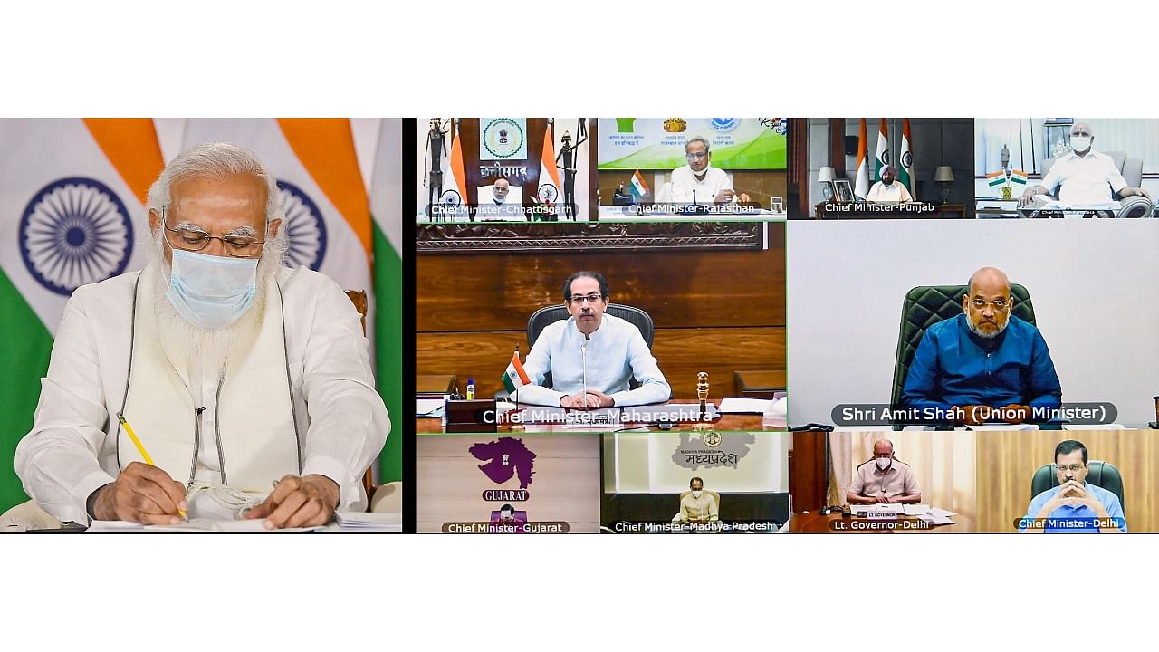 Prime Minister Narendra Modi during a meeting with chief ministers on Covid-19 situations through video conferencing. Credit: PTI Photo