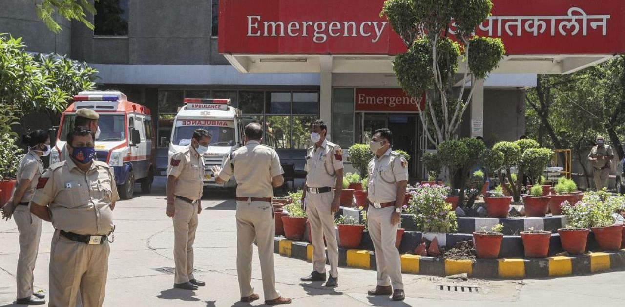 Police personnel visit Jaipur Golden hospital after at least 20 critically Covid-19 patients died amid oxygen scarcity at the hospital in New Delhi, Saturday, April 24, 2021. Credit: PTI Photo