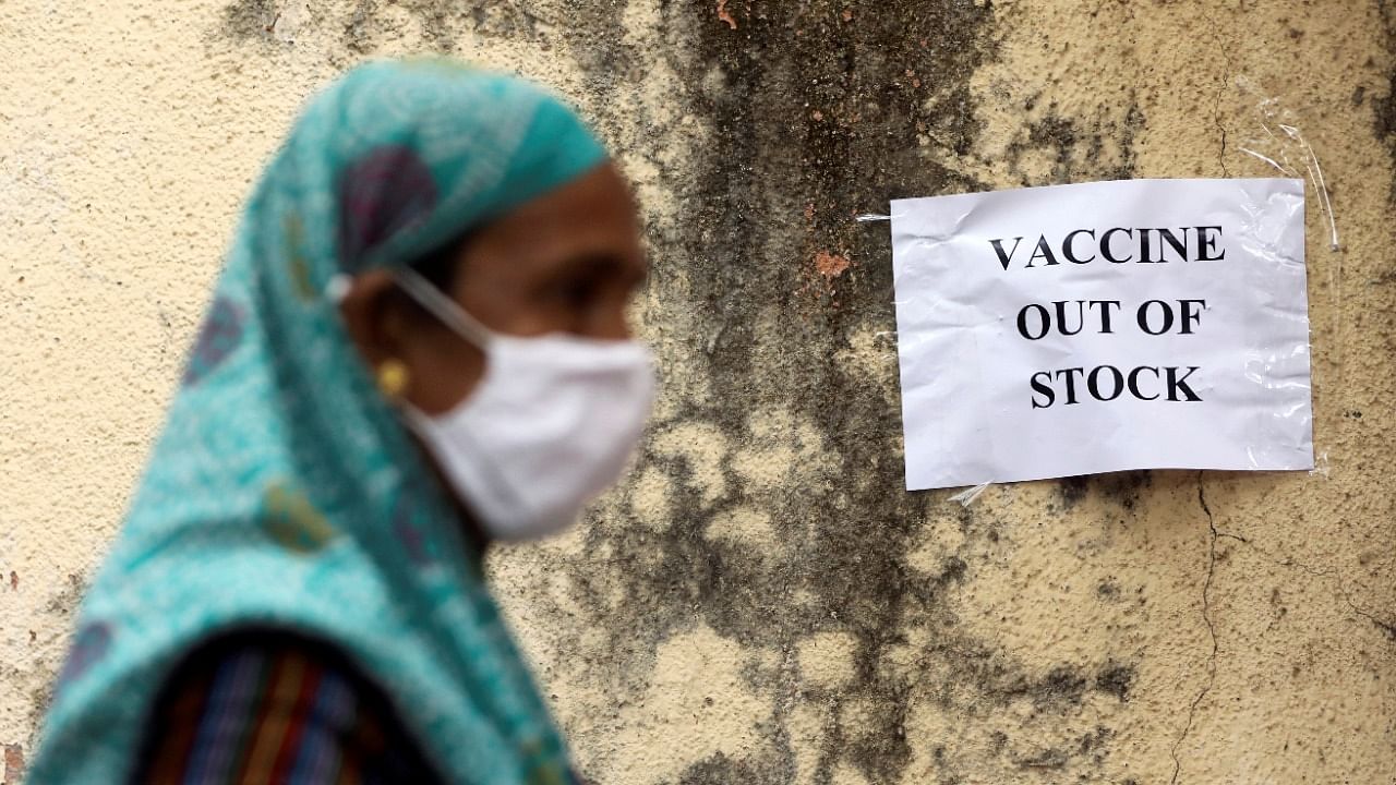 A notice about the shortage of coronavirus vaccine supplies is seen at a vaccination centre, in Mumbai, India, April 8, 2021. Credit: Reuters Photo