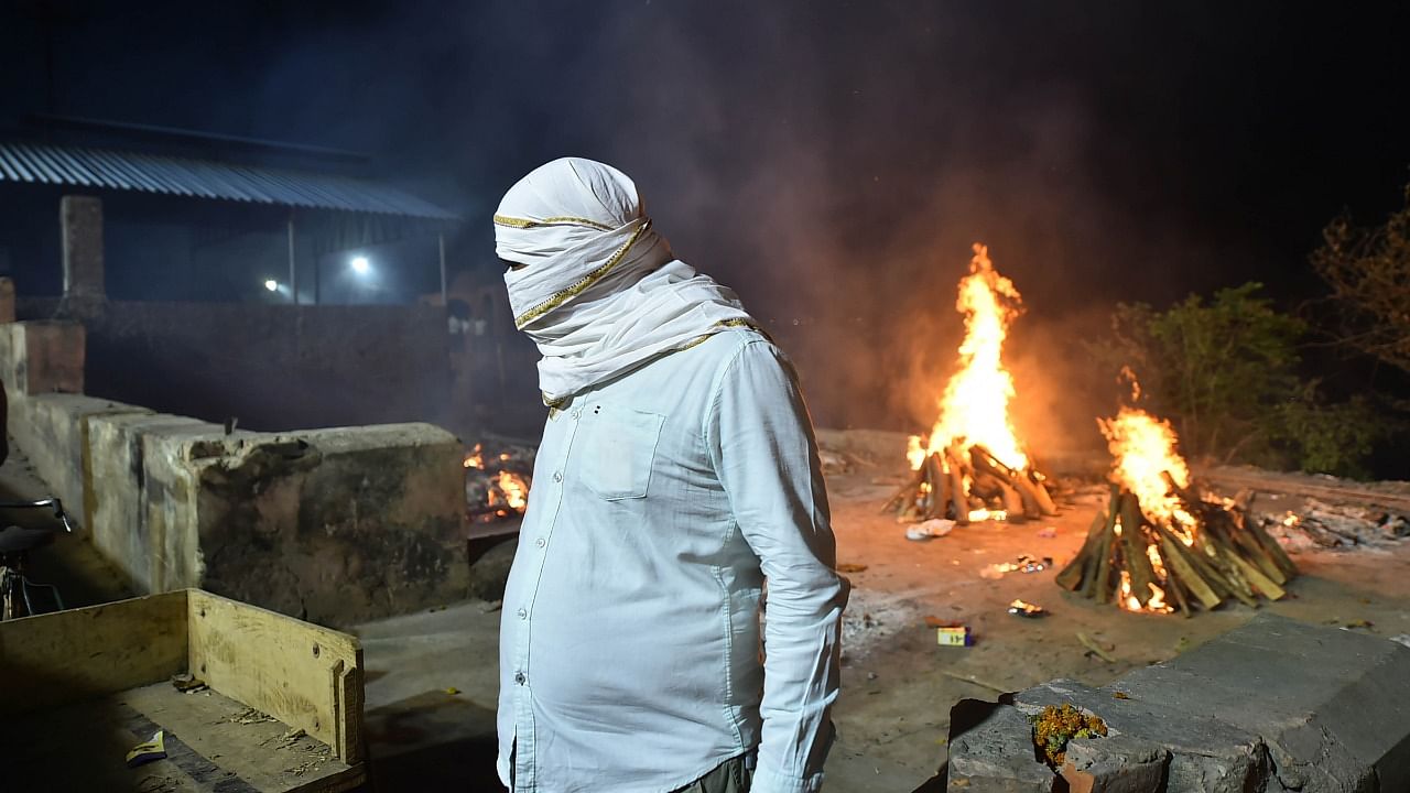 Covid-19 victims being cremated at Bhairav Ghat Hindu Crematory, as coronavirus cases surge in record numbers across the country, in Kanpur, Sunday, April 25, 2021. Credit: PTI Photo