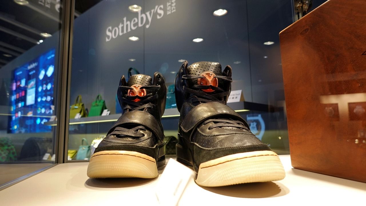 A pair of 'Nike Air Yeezy 1' prototype sneakers designed by Kanye West, are displayed at the Hong Kong Convention and Exhibition Centre before going up for private sale at Sotheby's, in Hong Kong, China April 16, 2021. Credit: Reuters Photo