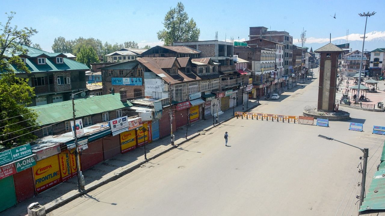 A deserted view of the Lal Chowk area during corona curfew, in Srinagar. Credit: PTI File Photo
