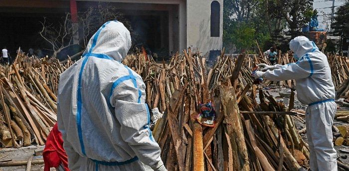 An unimaginable tragedy is unfolding at New Delhi's crematoriums. Credit: AFP Photo