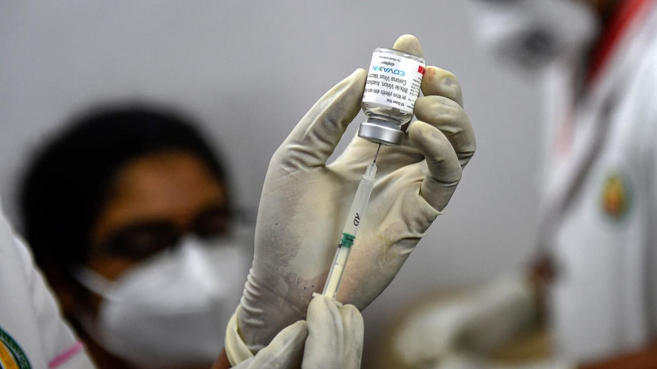 A medic prepares to administer a dose of Covid-19 vaccine at the Government Omandurar Medical College and Hospital, in Chennai. Credit: PTI Photo