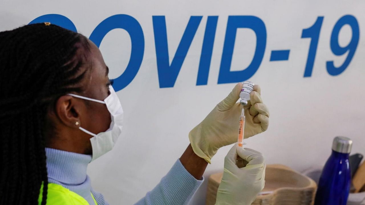 A dose of AstraZeneca vaccine is prepared at Covid-19 vaccination centre in the Odeon Luxe Cinema in Maidstone, Britain. Credit: Reuters Photo