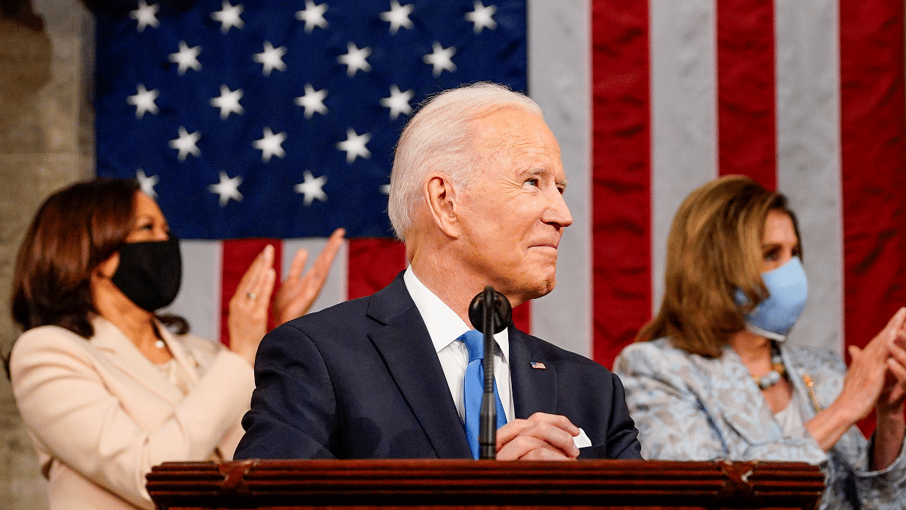 Biden told Congress and the nation on primetime television that "in America, we always get up". Credit: Reuters Photo