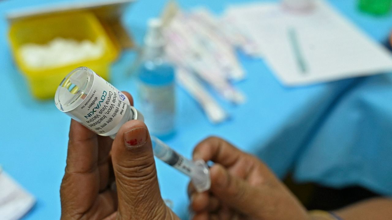 A medical worker prepares a jab of the Covaxin Covid-19 coronavirus vaccine, at a health centre in New Delhi on April 29, 2021. Credit: AFP Photo