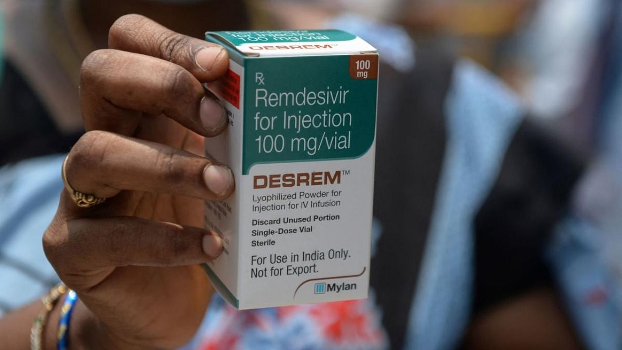 A woman holds a box of Remdesivir, an antiviral drug used to treat Covid-19 symptoms. Credit: AFP Photo