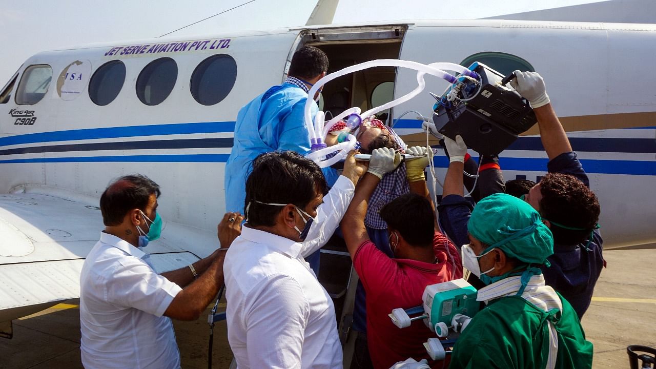 A Covid-19 patient being airlifted from Jabalpur to Hyderabad for treatment, during the second wave of pandemic in Jabalpur. Credit: PTI Photo
