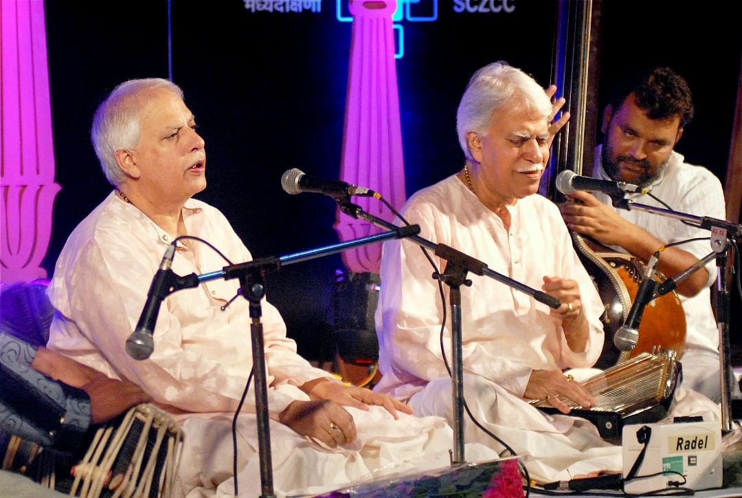Pandit Rajan Mishra (right) with his younger brother Sajan at a concert in Nagpur. Rajan died on Sunday. PTI FILE PHOTO