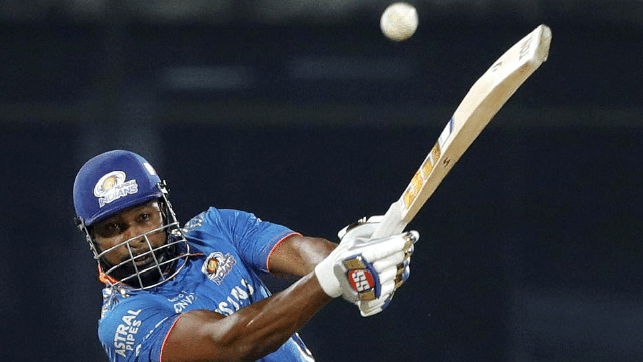 Kieron Pollard of Mumbai Indians hitting a over boundary during match 27 of the Vivo Indian Premier League between the Mumbai Indians and the Chennai Super Kings held at the Arun Jaitley Stadium,in New Delhi,May 1, 2021.  Credit: PTI Photo