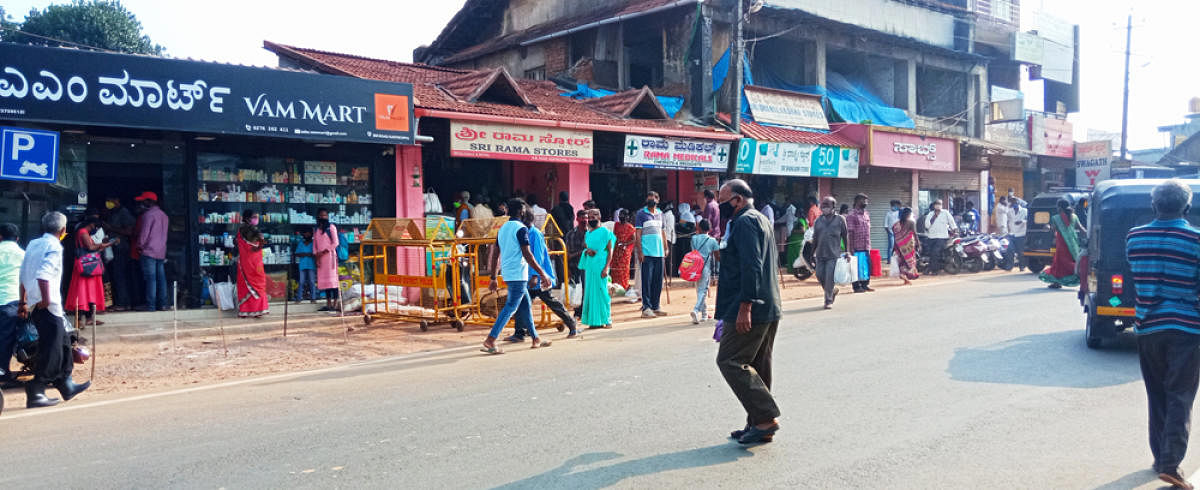 People thronged shops to purchase essential items in Suntikoppa town on Sunday morning.