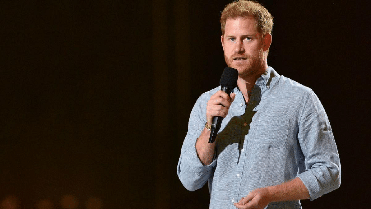Co-Chair Britain's Prince Harry, Duke of Sussex, gestures as he speaks onstage during the taping of the "Vax Live" fundraising concert at SoFi Stadium in Inglewood, California. Credit: AFP Photo.
