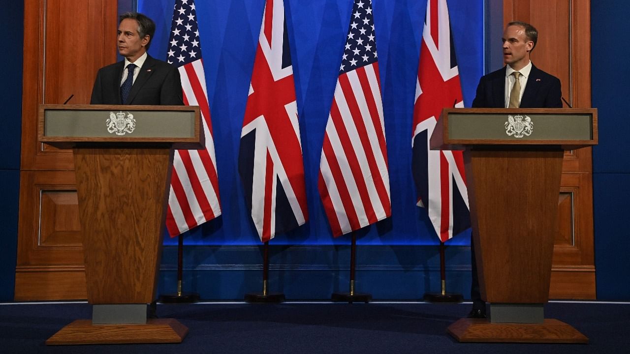 US Secretary of State Antony Blinken (L) attends a press conference with Britain's Foreign Secretary Dominic Raab following their bilateral meeting in London. Credit: AFP Photo