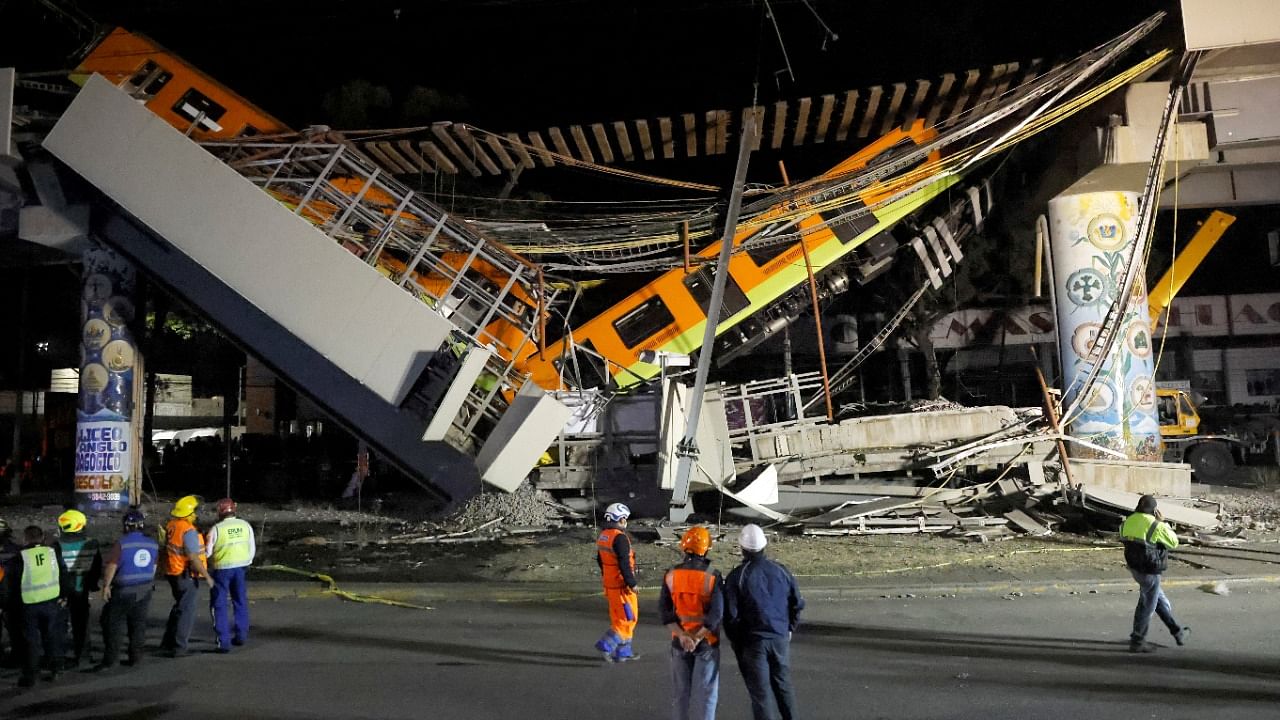 The site where an overpass for a metro partially collapsed with train cars on it is seen at Olivos station in Mexico City. Credit: Reuters Photo