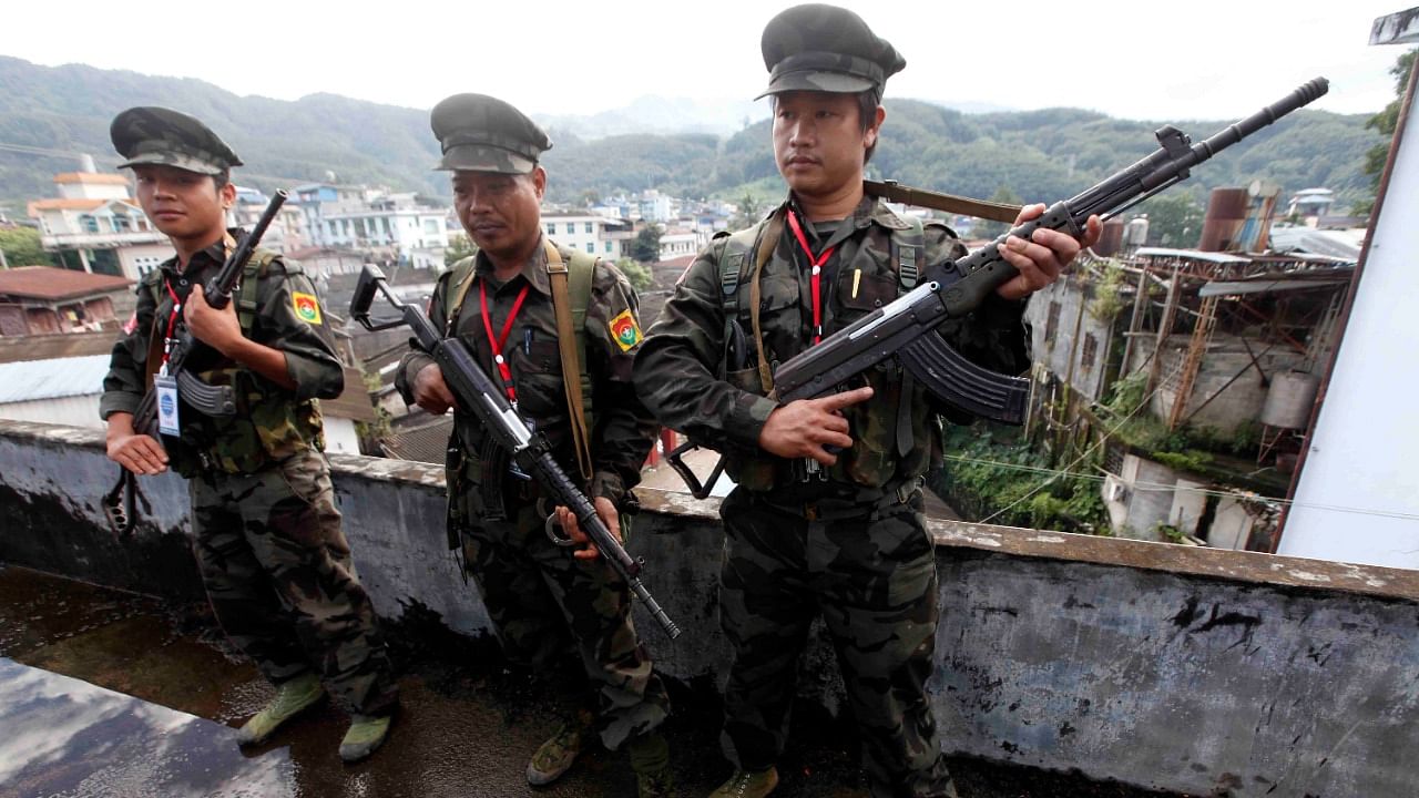 Soldiers of the Kachin Independence Army (KIA) stand on guard in Laiza, a border town of China and Myanmar, Kachin State, Myanmar. Credit: AP/PTI File Photo