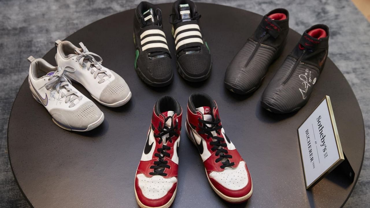 Shoes worn by Steve Nash, "Air Jordan 1" worn by Michael Jordan, a pair of Adidas worn by Kevin Garnett, and Nike "Air Pippen V" worn by Scottie Pippen are pictured during an auction preview in Geneva, Switzerland, April 28, 2021. Credit: Reuters Photo