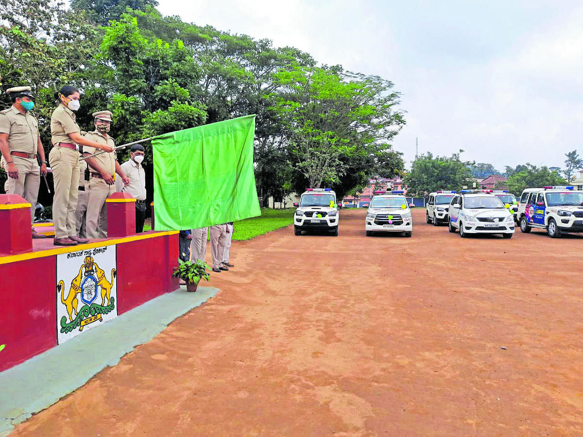 Superintendent of Police Kshama Mishra flags off the ERSS vehicles at the district police ground in Madikeri on Tuesday.