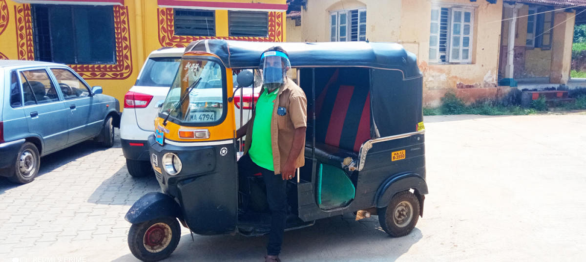 B K Prashanth with his autorickshaw.