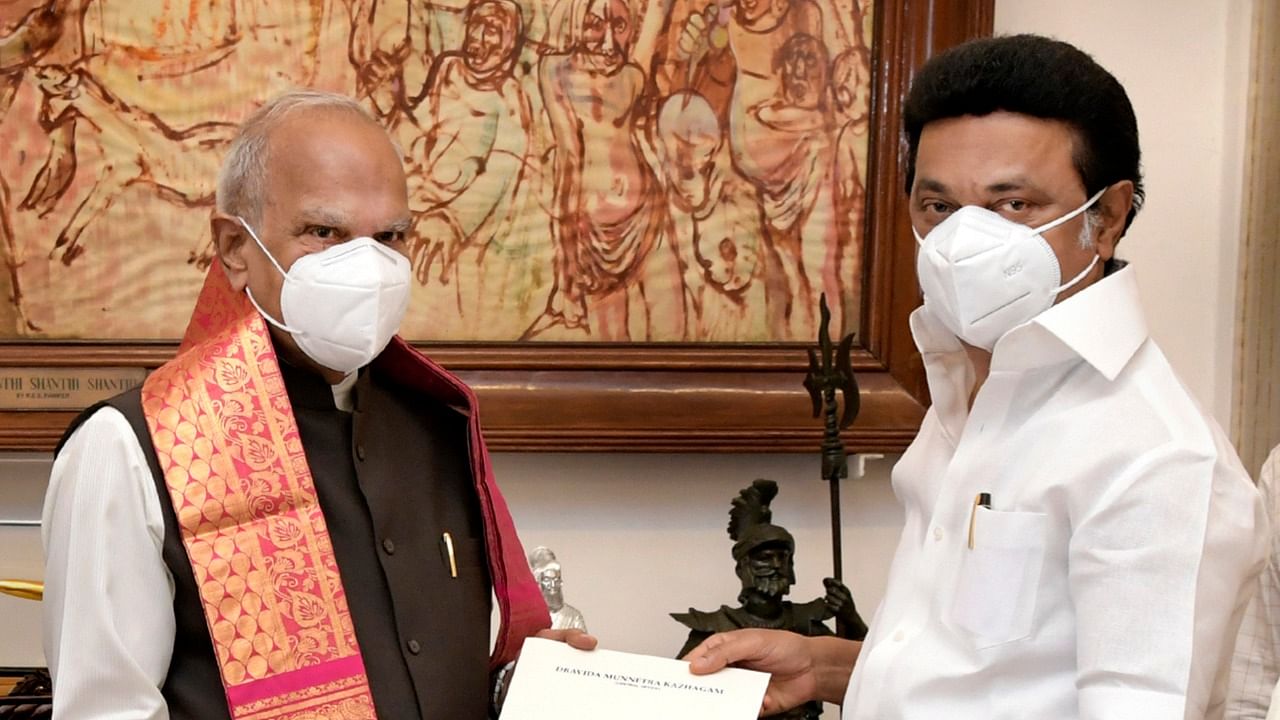 DMK President MK Stalin meets Tamil Nadu Governor Banwarilal Purohit to stake claim to form the new government. Credit: PTI Photo