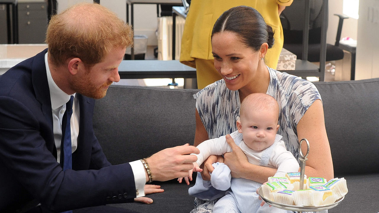 Prince Harry, Meghan and Archie. Credit: AFP Photo