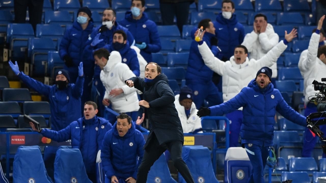 Chelsea manager Thomas Tuchel and the bench react at the win against Madrid. Credit: Reuters Photo