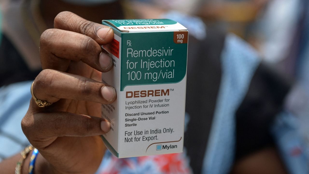 A woman holds a box of Remdesivir, an antiviral drug used to treat Covid-19 symptoms. Credit: AFP Photo