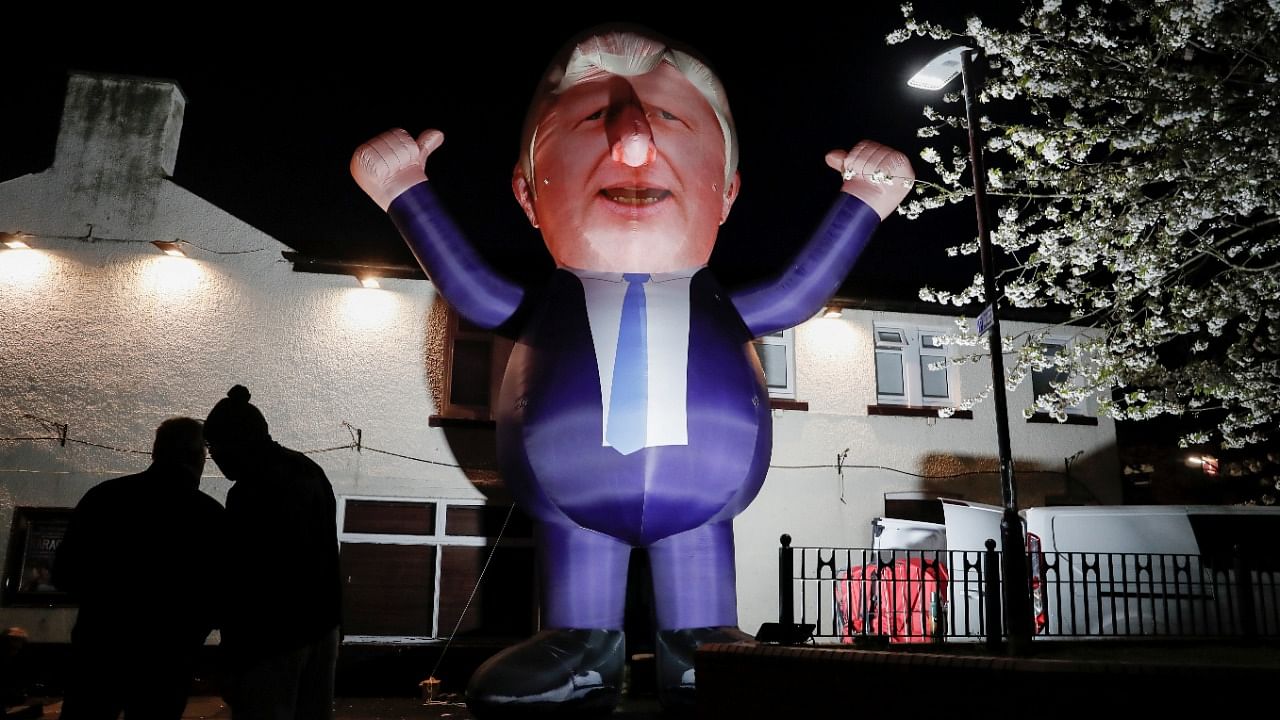 An inflatable figure of Prime Minister Boris Johnson is seen outside Mill House Leisure Centre as ballots are being counted, in Hartlepool, Britain May 7, 2021. Credit: Reuters File Photo