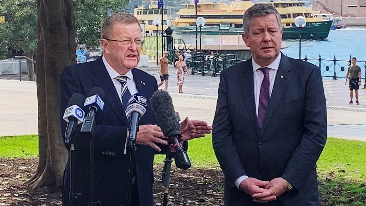 International Olympic Committee Vice President John Coates and Australian Olympic Committee Chief Executive Matt Carroll hold a news conference at Sydney harbour, Australia May 8, 2021. Credit: Reuters Photo