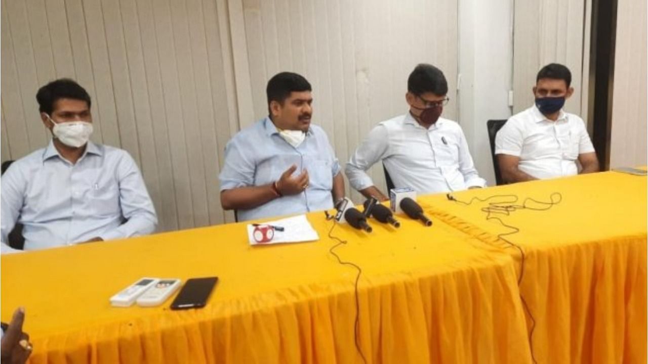 MLA D Vedavyas Kamath speaks to media persons in Mangaluru on Friday. Credit: DH Photo