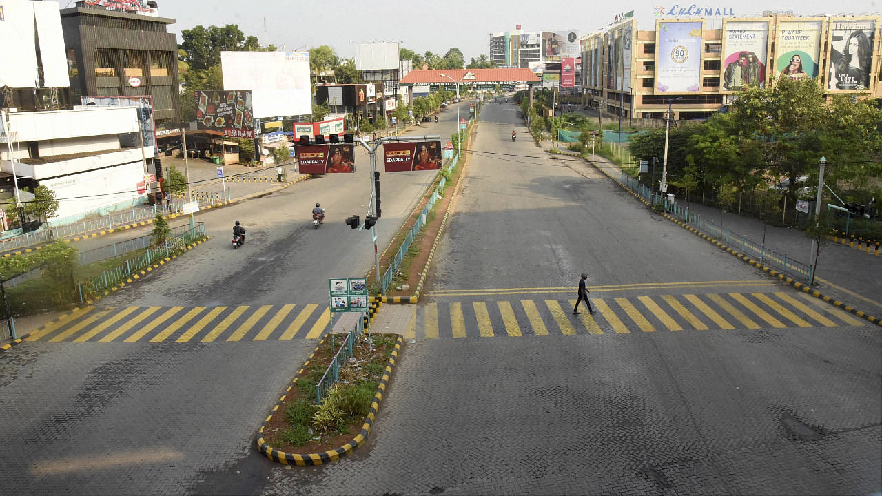 A city street wears a deserted look during a Covid-19 lockdown in Kochi. Credit: PTI Photo