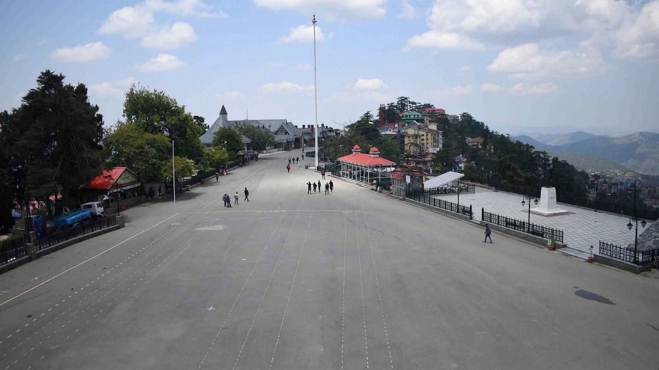 Ridge road wears a deserted view during the Covid-19 curfew, in Shimla. Credit: PTI Photo