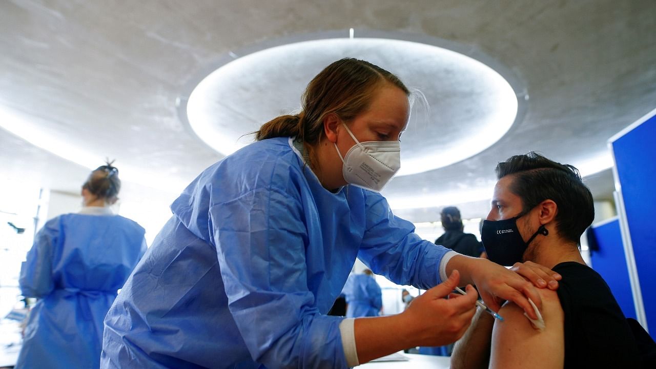 A man receives a dose of the AstraZeneca Covid-19 vaccine in the Central Mosque in Ehrenfeld suburb. Credit: Reuters Photo