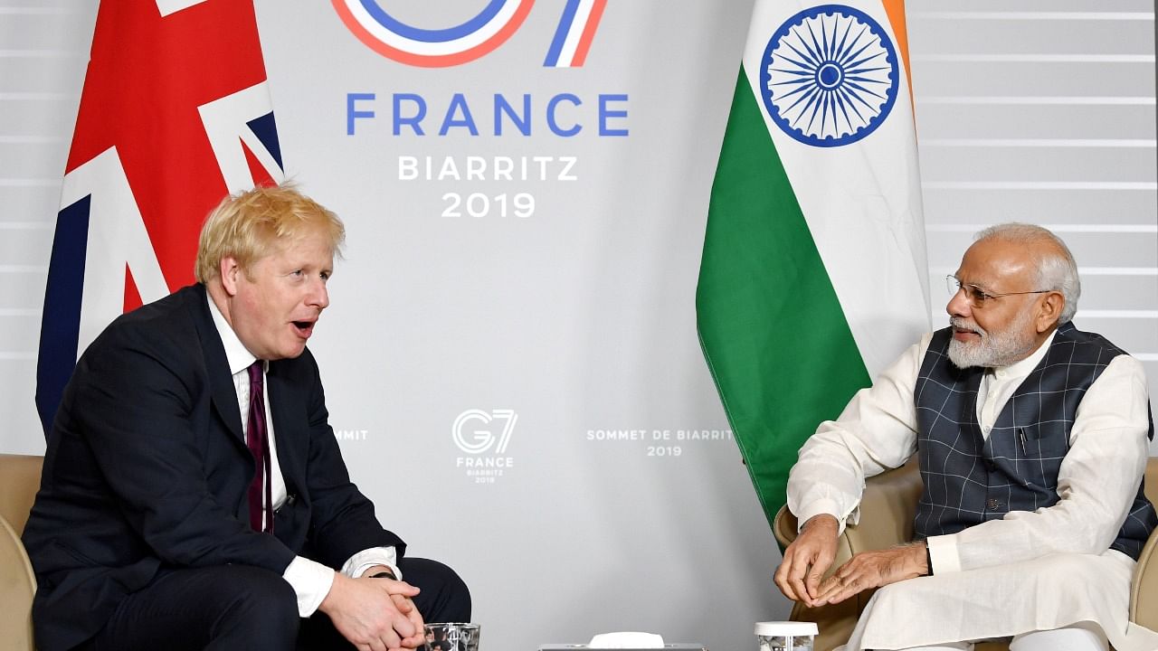 Britain's Prime Minister Boris Johnson meets Indian Prime Minister Narendra Modi at a bilateral meeting during the G7 summit in Biarritz, France August 25, 2019. Credit: Reuters File Photo