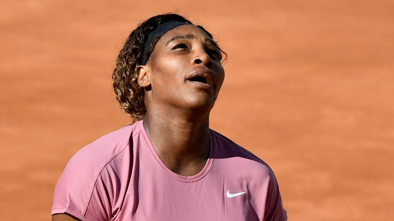Serena Williams reacts after losing to Argentina's Nadia Podoroska during their Italian Open match at Foro Italico. Credit: AFP Photo
