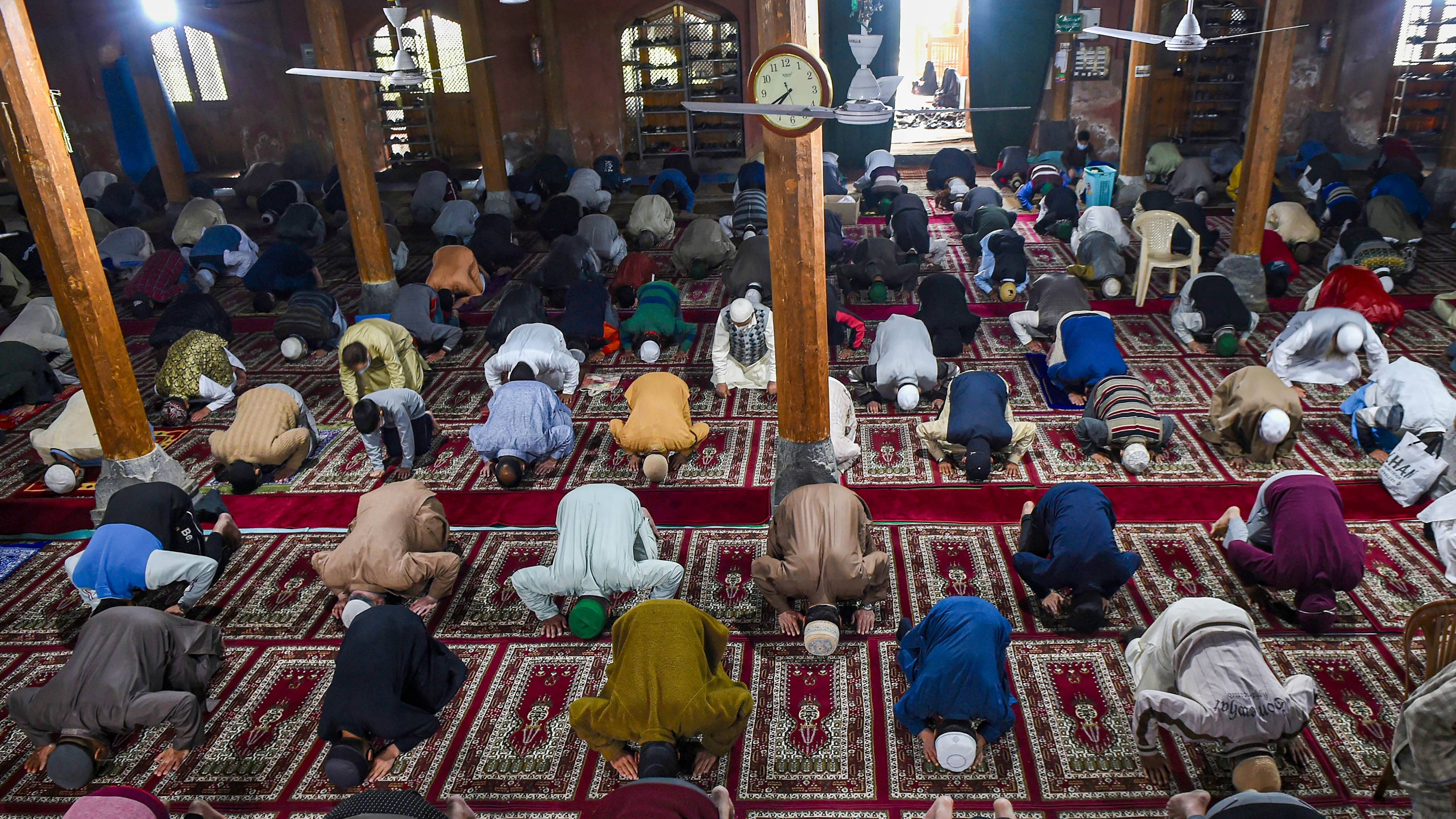 People offered the Eid prayers in small congregations at local mosques, mostly early in the morning. Credit: PTI Photo