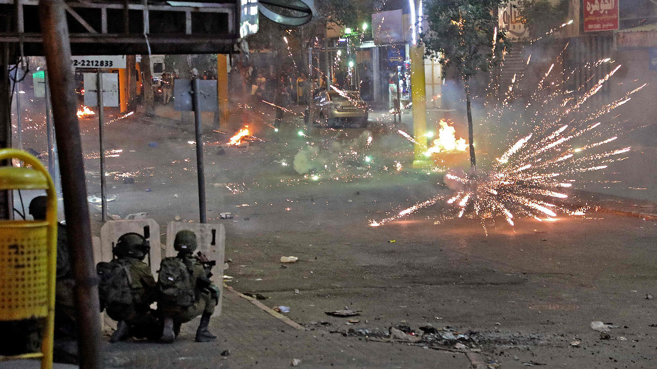 Coinciding with the aerial bombardments is surging violence between Arabs and Jews inside Israel. Credit: AFP Photo