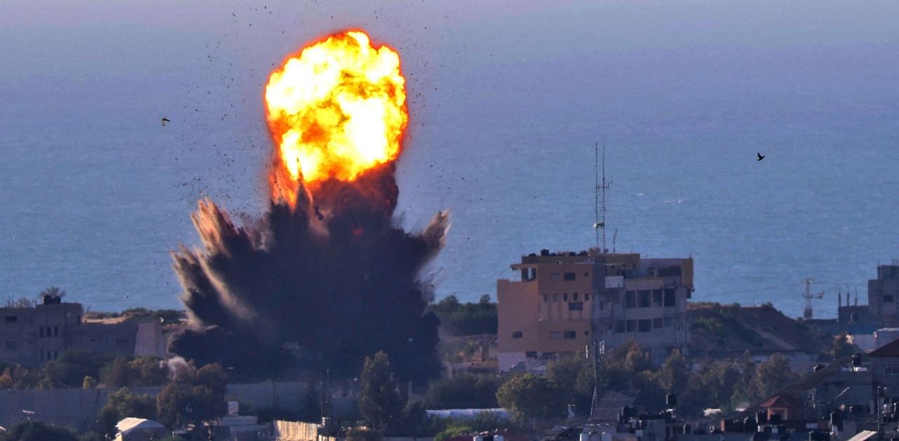 Smoke billows from an explosion following an Israeli air strike in the Gaza strip. Credit: AFP Photo