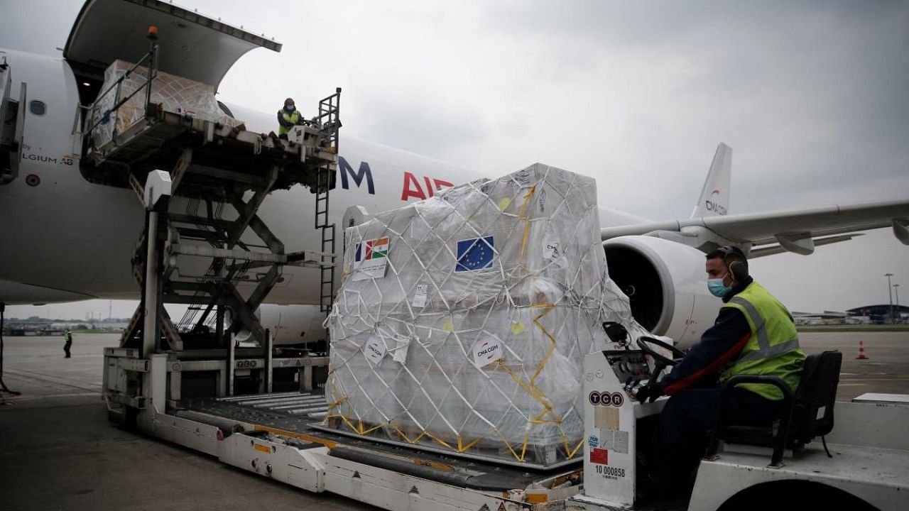 Medical supplies being loaded into a cargo plane to be sent to India, at Roissy airport, north of Paris. Credit: AFP Photo